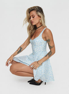 side view of model wearing Princess Polly Gozette Mini Dress Blue Floral Sweetheart Neckline 