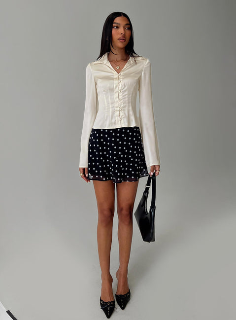 back view of model wearing Princess Polly Miravella Long Sleeve Top Cream Full Sleeves V-Neck 