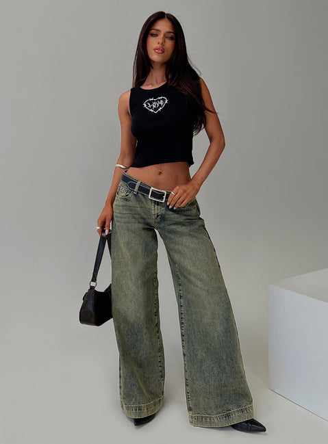 side view of model wearing Princess Polly Radiantia Tank Top Black Sleeveless Crew Neck 