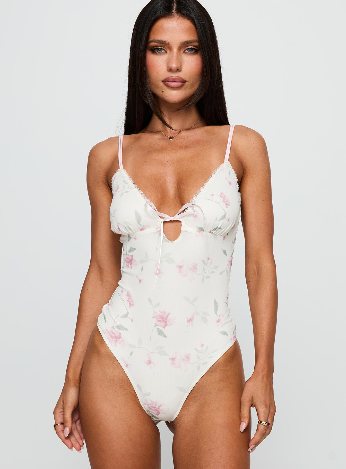 front view of model wearing Princess Polly Final Fantasy Bodysuit Multi Floral Sleeveless 