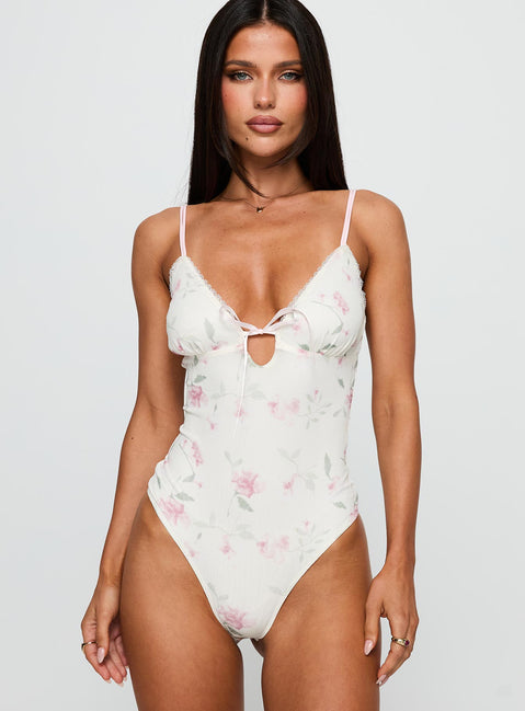 front view of model wearing Princess Polly Final Fantasy Bodysuit Multi Floral Sleeveless 