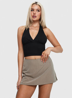 front view of model wearing Princess Polly Gigi Skort Beige Pinstripe Tall High Waisted Shorts 