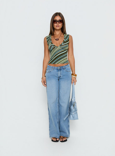 front view of model wearing Princess Polly Ramos Low Rise Denim Jeans Bright Blue Wash Mid Rise Jeans 