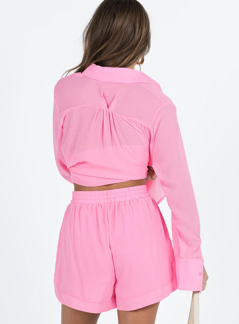 Pink matching set Long sleeve shirt Classic collar Button fastening at front Single chest pocket Shorts Thick elasticated waistband Twin hip pockets
