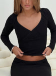 front view of model wearing Princess Polly Memi Long Sleeve Top Black Full Sleeves V-Neck 