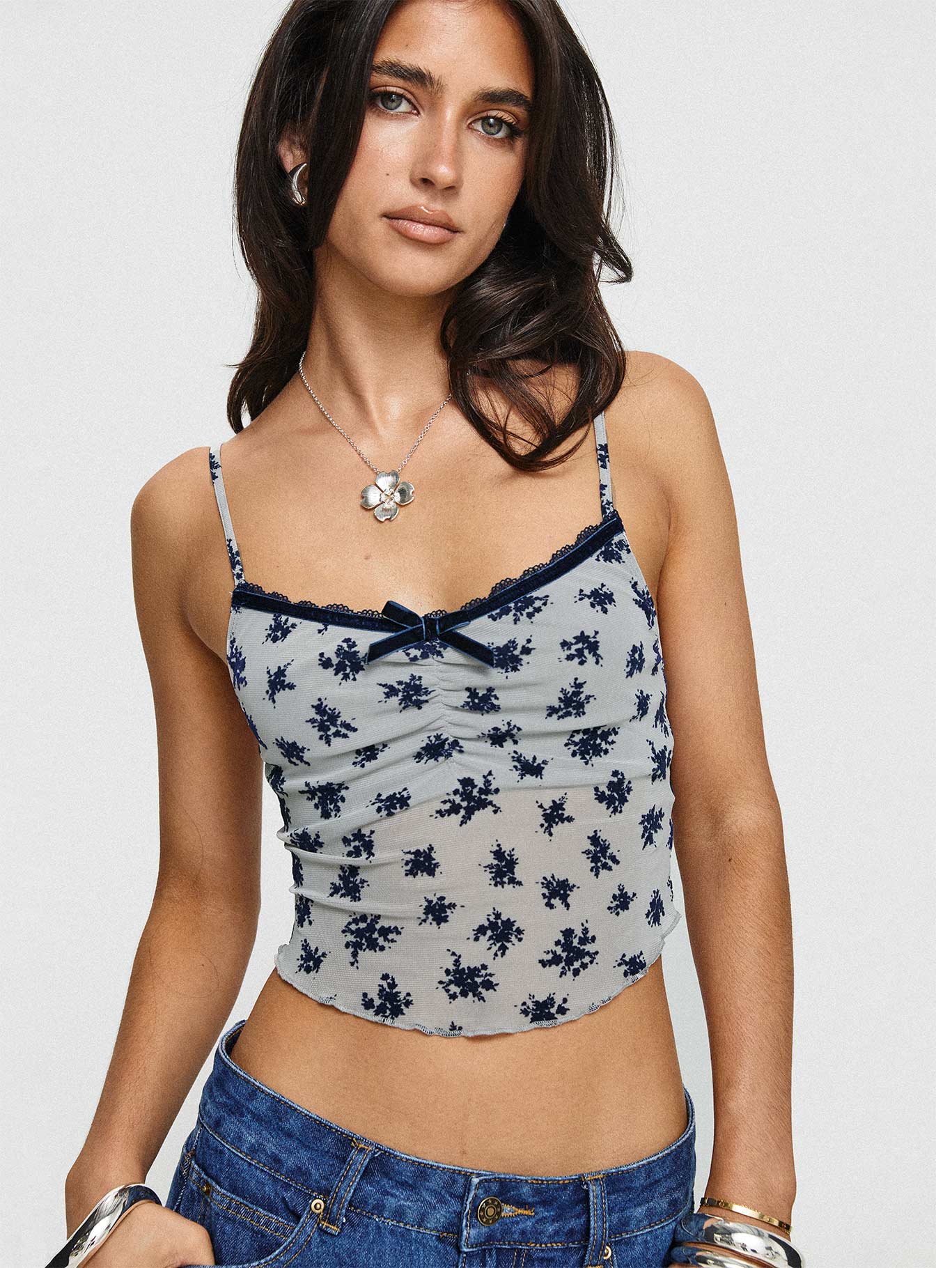 front view of model wearing Princess Polly Norde Top Floral Cluster Pale Grey Sleeveless V-Neck 