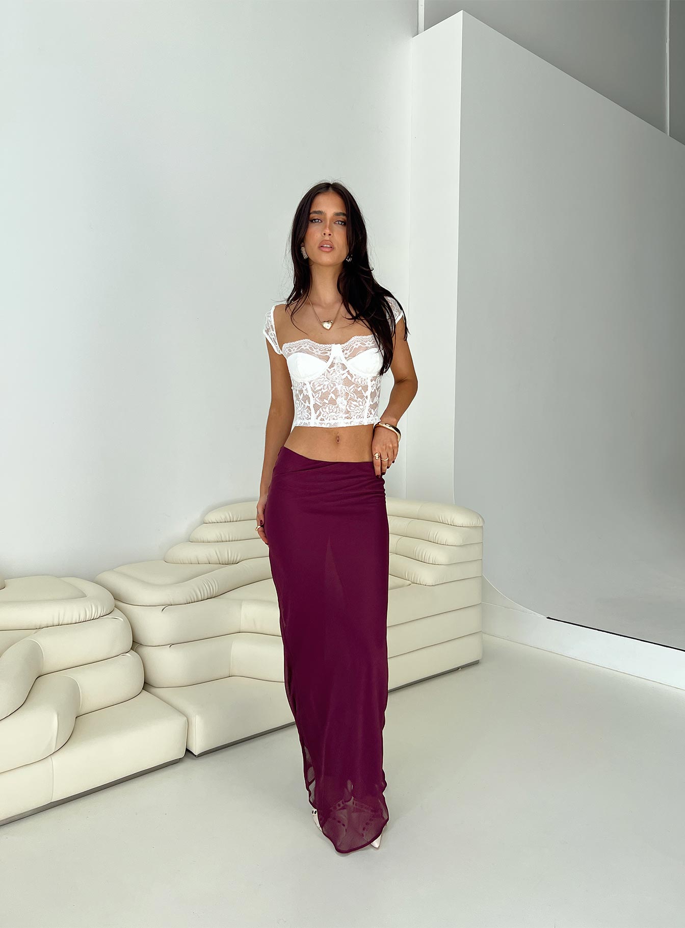   side view of model wearing Princess Polly Devon Maxi Skirt Burgundy Maxi 