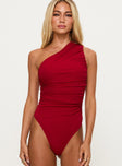 front view of model wearing Princess Polly Heston Asymmetrical Ruched Bodysuit Red Sleeveless 