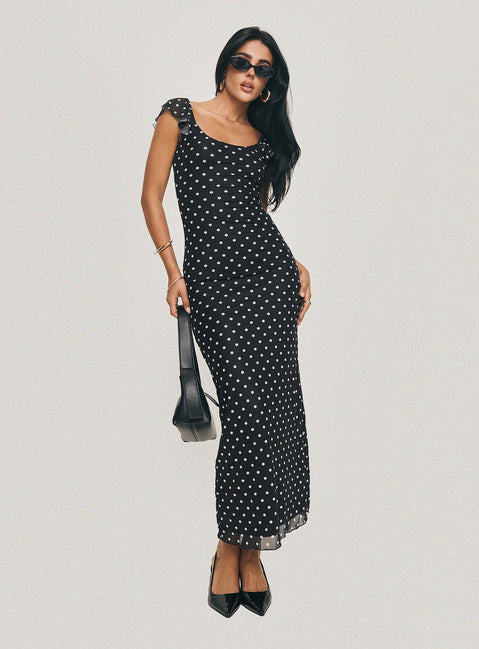 side view of model wearing Princess Polly Sandberg Maxi Dress Black Polka Dot Scoop Neck 