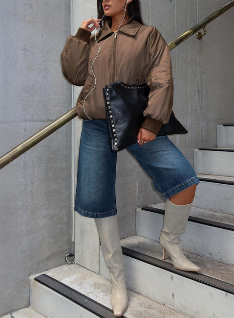 front view of model wearing Princess Polly Ollison Longline Denim Shorts Blue High Waisted Shorts 