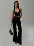 front view of model wearing Princess Polly Stellina Slim Fit Flared Pants Black High Waisted Pants 