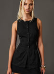 Vest top High neckline, button fastening, twin hip pockets, tie detail at back Non-stretch material, fully lined 