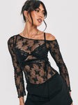 front view of model wearing Princess Polly Velvera Long Sleeve Mesh Top Black Full Sleeves Asymmetric Neckline 