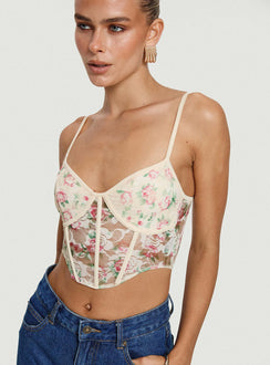 side view of model wearing Princess Polly Romania Top Cream / Floral Sleeveless Sweetheart 