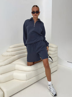 front view of model wearing Princess Polly Dream Fleece Longline Shorts Navy High Waisted Shorts 