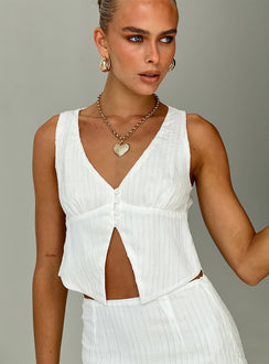 Two piece set Crop top, fixed shoulder straps, v-neckline, button fastening at bust, split hem High-rise mini skirt, invisible zip fastening at side Non-stretch material, fully lined