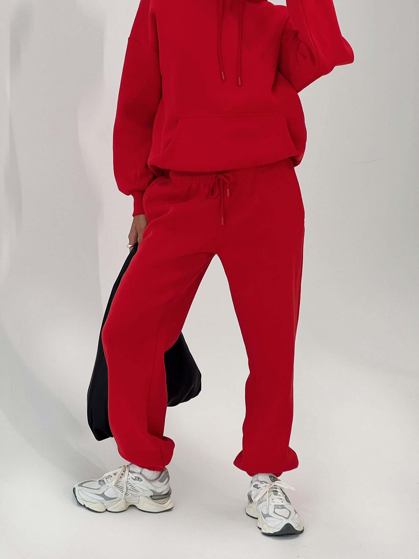 front view of model wearing Princess Polly Dream Fleece Ankle Cuff Sweatpants Red High Waisted Pants 
