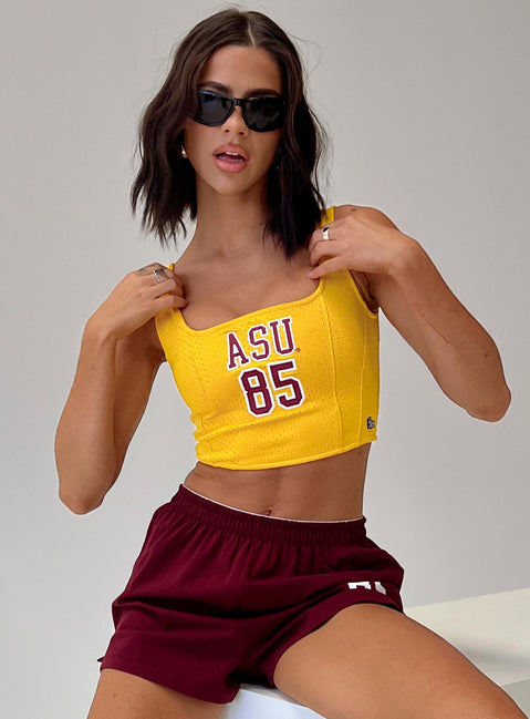 front view of model wearing Princess Polly ASU Jersey Corset Top Gold Sleeveless Square Neck 