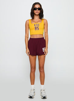 front view of model wearing Princess Polly ASU Soffee Shorts Maroon High Waisted Shorts 