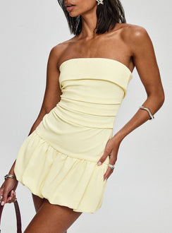side view of model wearing Princess Polly Mousse Strapless Mini Dress Lemon Straight Neck 