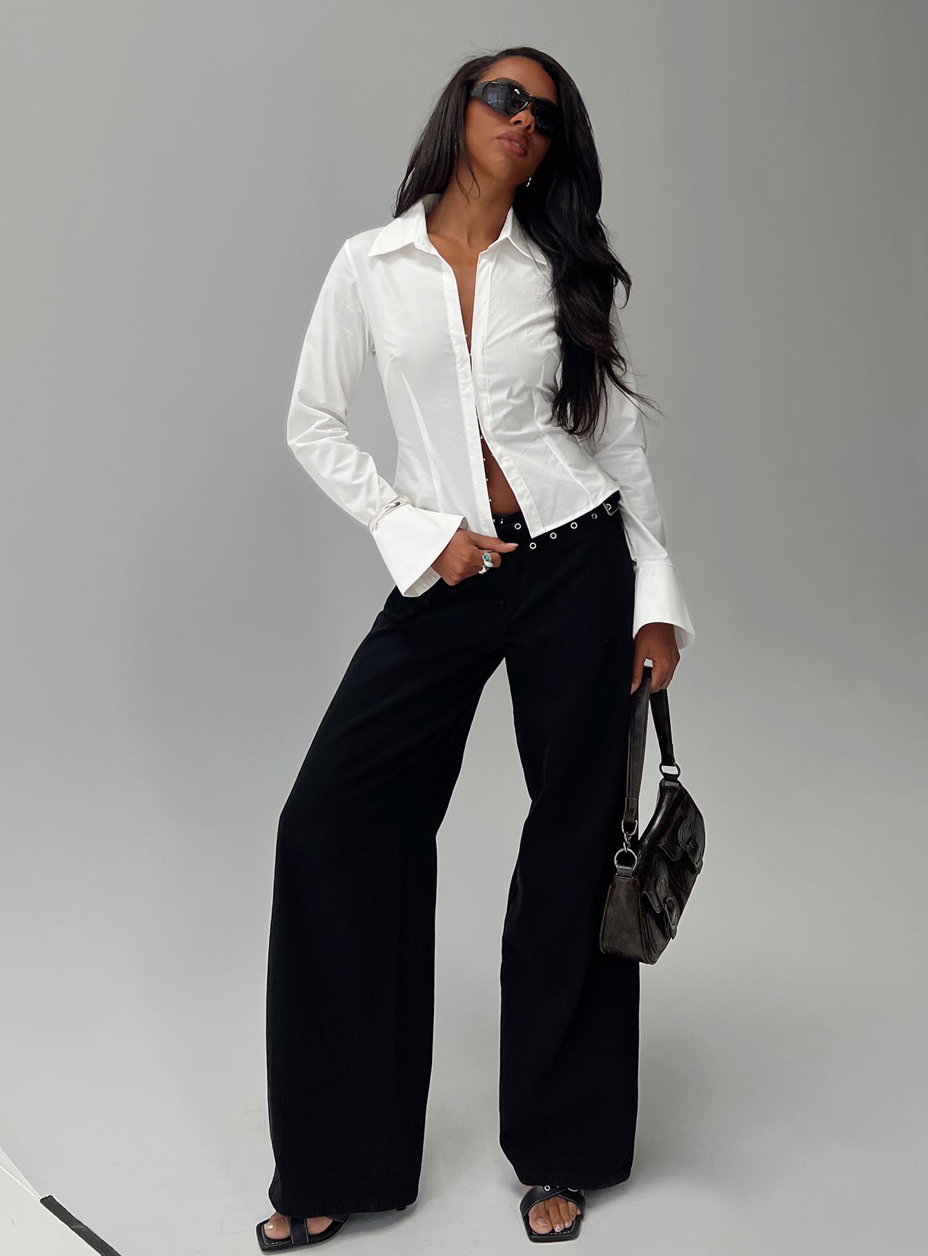 side view of model wearing Princess Polly By The Phone Long Sleeve Collared Top White Full Sleeves V-Neck 