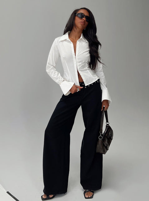 side view of model wearing Princess Polly By The Phone Long Sleeve Collared Top White Full Sleeves V-Neck 