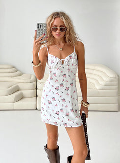 side view of model wearing Princess Polly Perries Mini Dress White Floral Sweetheart Neckline 