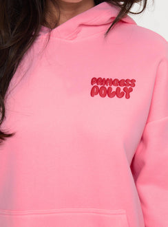 side view of model wearing Princess Polly Princess Polly Hooded Sweatshirt Bubble Text Pink / Red Long 