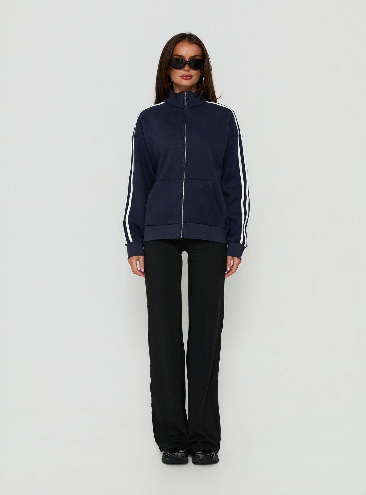 Featuring the Keeran Funnel Neck Fleece Jumper Navy / White womens jumpers in short length front view of model wearing Princess Polly