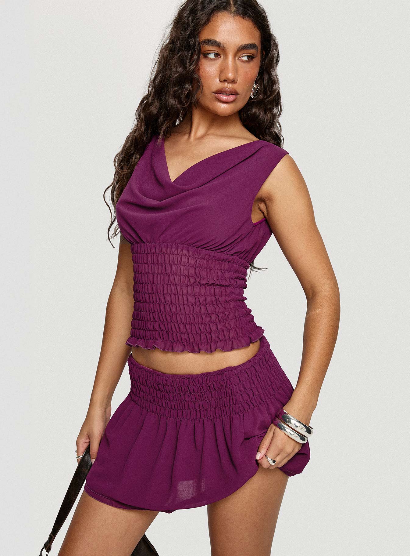 side view of model wearing Princess Polly I Belong Shirred Top Wine Sleeveless Cowl 