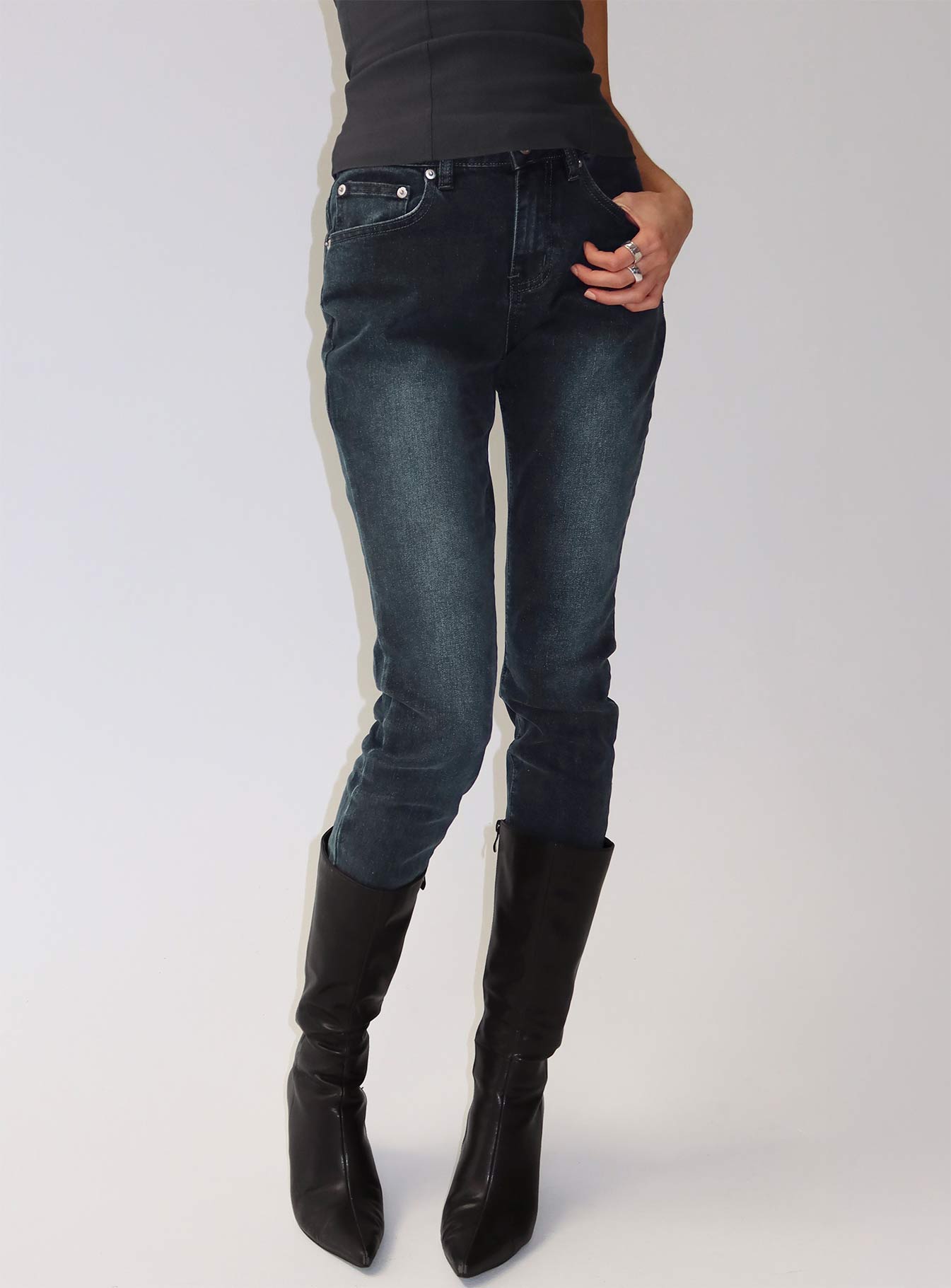 back view of model wearing Princess Polly Illyssa Mid Rise Skinny Jeans Washed Charcoal Mid Rise Jeans 