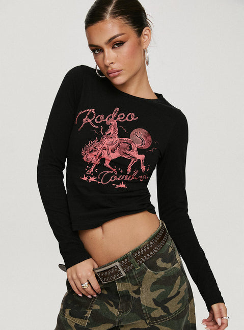 front view of model wearing Princess Polly Rodeo Cowboy Long Sleeve Top Washed Wine Full Sleeves Crew Neck 