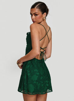 back view of model wearing Princess Polly Celena Mini Dress Forest Green Burnout Cowl Neck 
