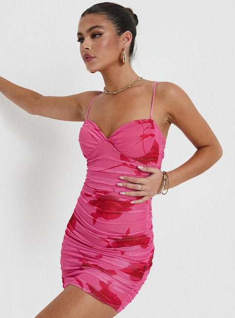 side view of model wearing Princess Polly Stevens Mini Dress Pink Floral Sweetheart Neckline 