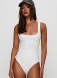 front view of model wearing Princess Polly Baseline Rib Bodysuit White Sleeveless 