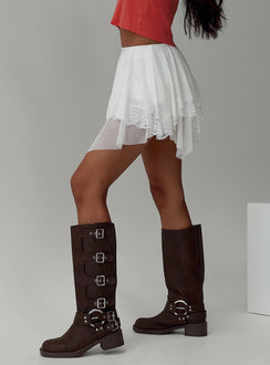   side view of model wearing Princess Polly Velenia Mini Skirt White Mini Skirts 