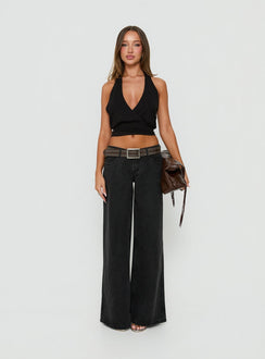 Showcasing the Picco Ultra Low Rise Wide Leg Jeans Washed Black in womens-jeans front view of model wearing