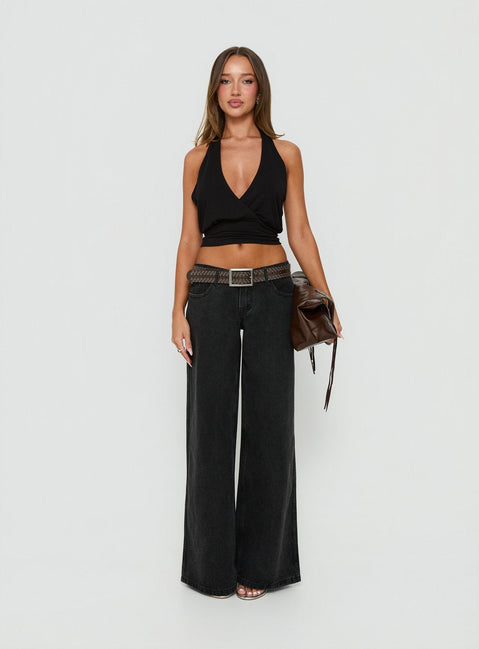 Showcasing the Picco Ultra Low Rise Wide Leg Jeans Washed Black in womens-jeans front view of model wearing