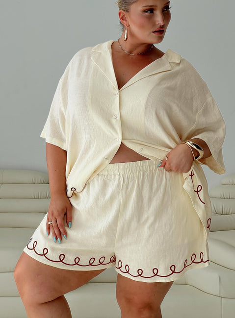 front view of model wearing Princess Polly Jamari Linen Blend Shirt Cream / Brown Curve Three Fourth Sleeves V-Neck 