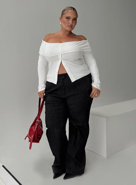 side view of model wearing Princess Polly Jeller Pinstripe Pants Black Curve High Waisted Pants 