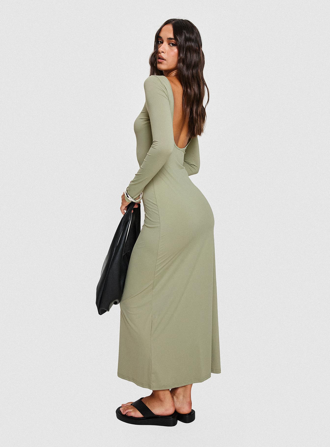 side view of model wearing Princess Polly Rain Fire Long Sleeve Maxi Dress Sage Boat Neck 