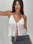 Lace top Halter neck tie fastening, tie detail at bust, split hem at front, sheer bodice Lined bust, good stretch