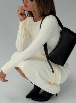 side view of model wearing Princess Polly Ryo Long Sleeve Rib Maxi Dress Cream Boat Neck 