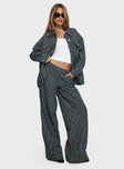 front view of model wearing Princess Polly Actually Invested Low Rise Pants Denim Stripe High Waisted Pants 