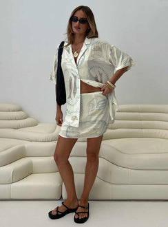   front view of model wearing Princess Polly Caraliia Mini Skirt Cream Mini Skirts 