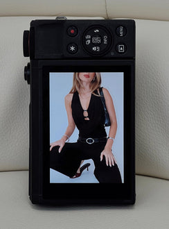 front view of model wearing Princess Polly Camera Flash Halter Top Black Glitter Sleeveless Cowl 