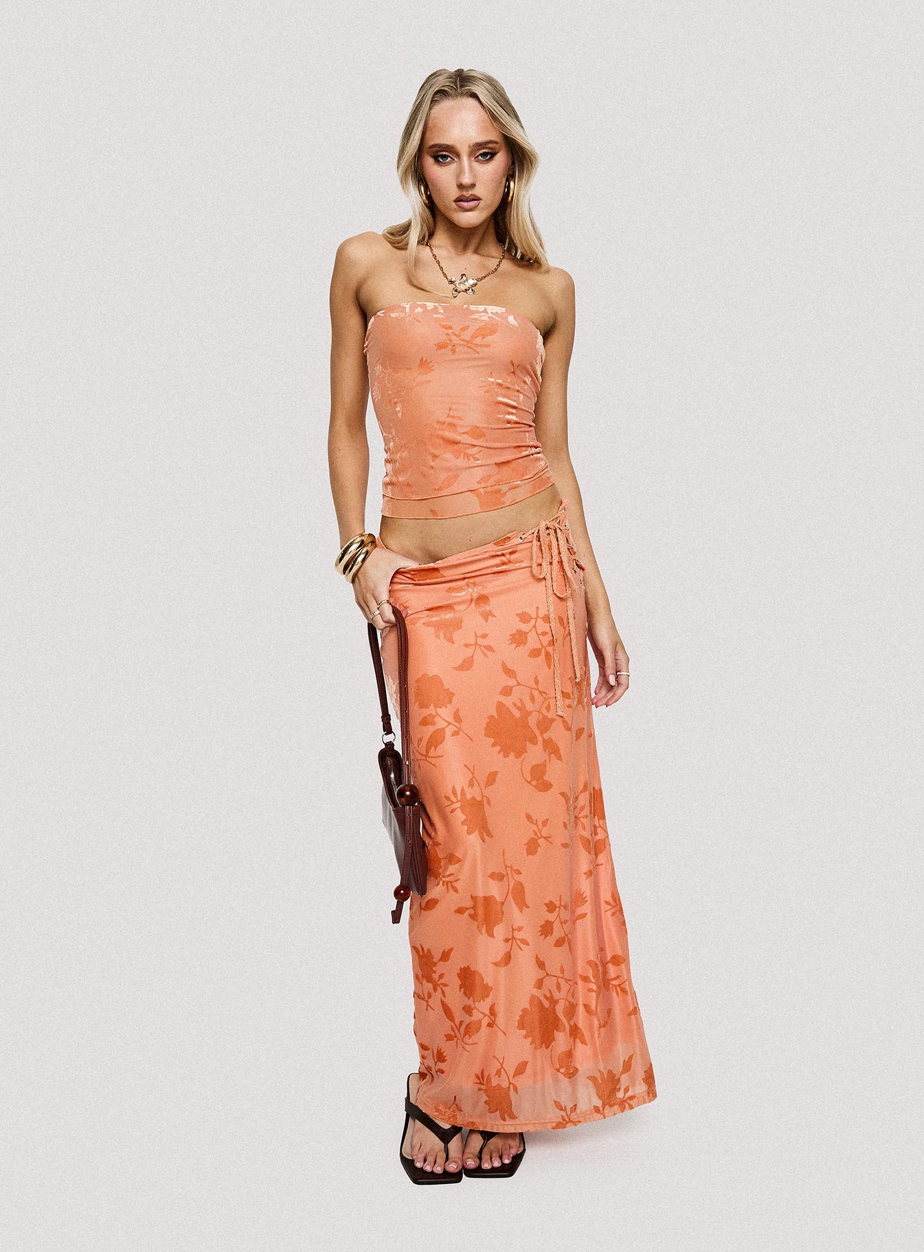   front view of model wearing Princess Polly Mikah Maxi Skirt Orange Maxi 