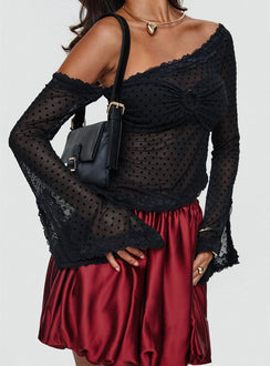 back view of model wearing Princess Polly Rubee Bubble Hem Mini Skirt Red Mini Skirts 