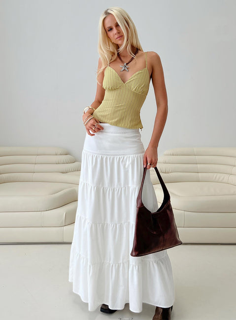   side view of model wearing Princess Polly Snowy River Tiered Maxi Skirt White Maxi 