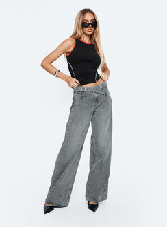 side view of model wearing Princess Polly Mckinley Mid Rise Wide Leg Jeans Washed Grey Mid Rise Jeans 
